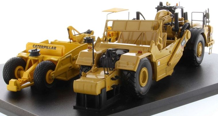 CAT 621K and #70 Scapers w/D7 Track Type Tractor
