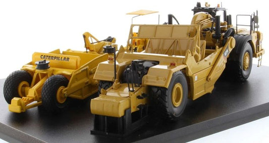CAT 621K and #70 Scapers w/D7 Track Type Tractor