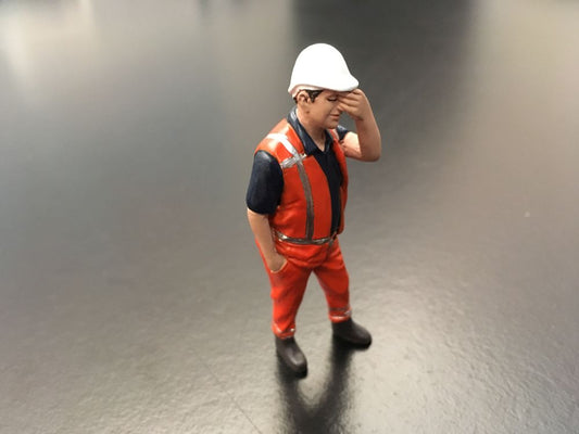 Worker scratching head Orange safety jacket with helmet 1/32