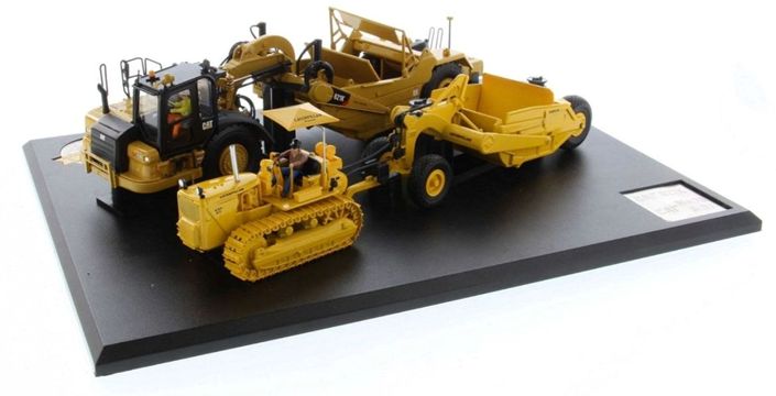 CAT 621K and #70 Scapers w/D7 Track Type Tractor
